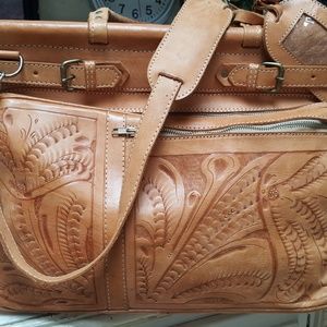 HAND TOOLED LEATHER LUGGAGE
